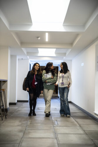 The Bedford Sixth students in school corridor